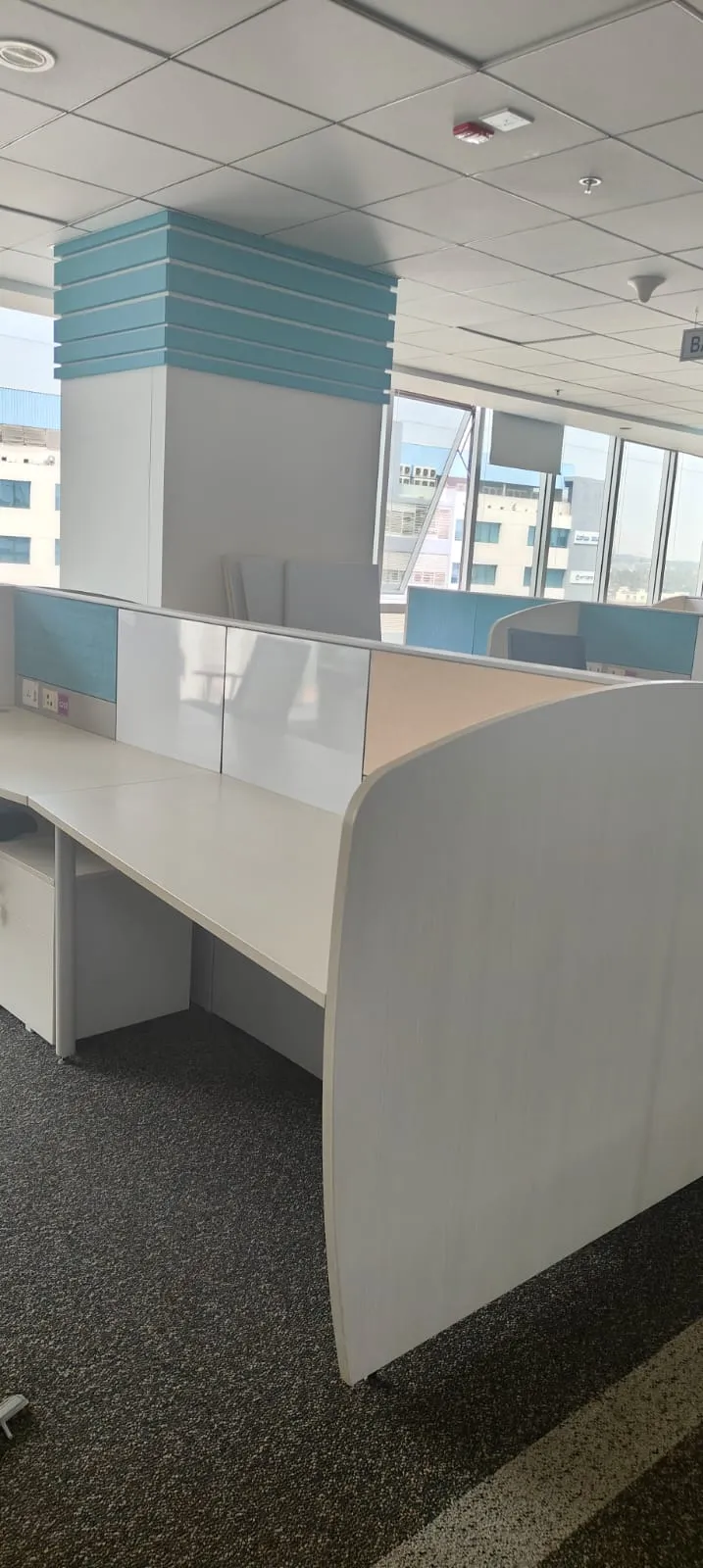 Interior view of a tech workspace restored to a bare shell layout during an office reinstatement workflow in Electronic City